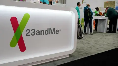 Reuters The 23andMe logo at a 2019 genealogy conference where the DNA testing company hosted a booth for attendees
