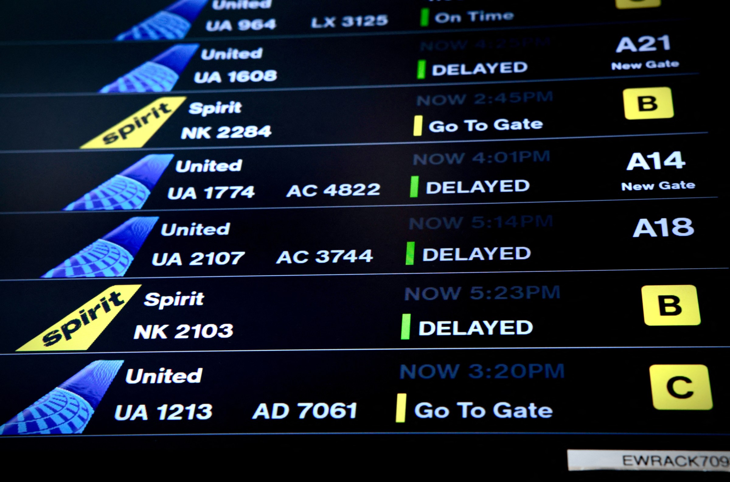 A screen displaying flight status is seen at Newark Liberty International Airport in Newark, New Jersey on May 7, 2025.
