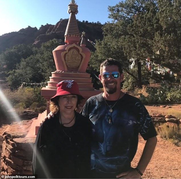 Polk, pictured with his mother Anna at the Buddha Stupa in Sedona, believes Sedona is such a high-traffic area for UFOs due to the vortexes the city is known for