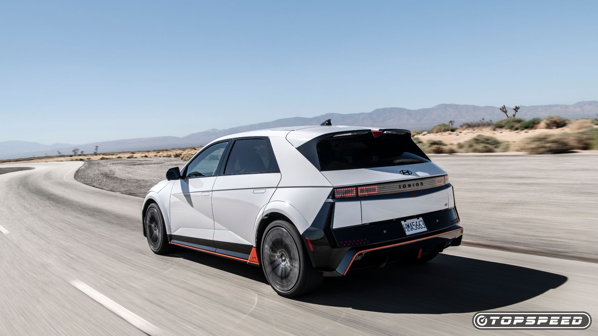 Hyundai Ioniq 5 driving on a desert highway