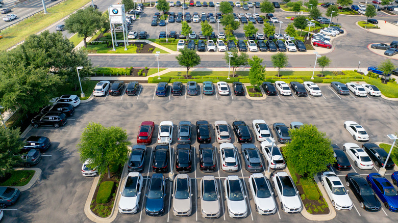 In an aerial view, BMW vehicles are displayed for sale on a lot at the BMW of South Austin dealership on May 16, 2025 in Austin, Texas.
