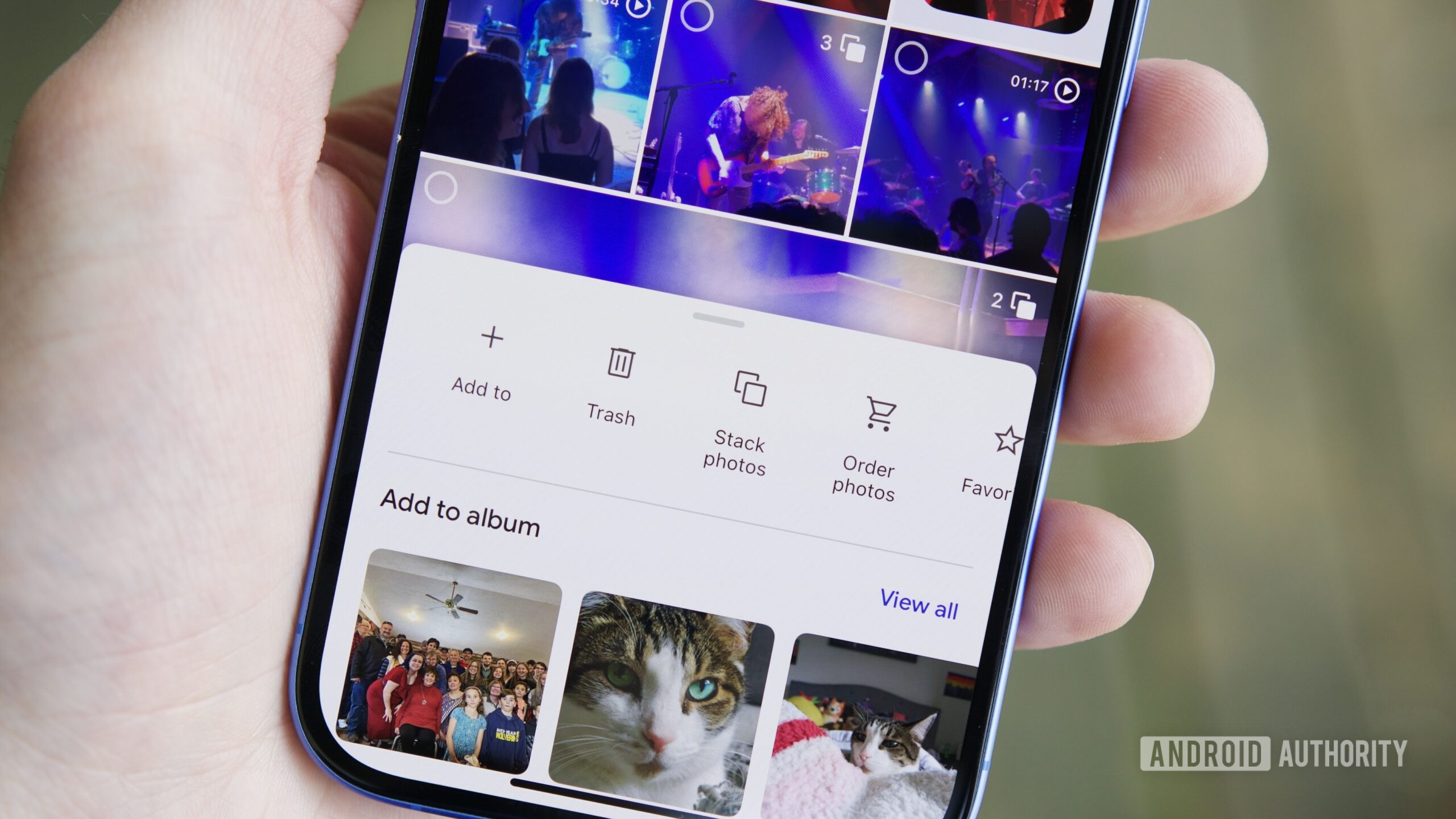 google photos manual stack photos button The "Stack photos" button in the Google Photos iOS app.