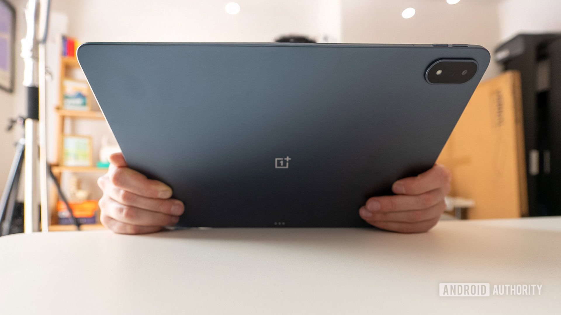 OnePlus Pad 3 Held in hands showing back OnePlus Pad 3 Held in hands showing back