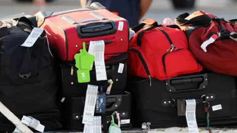 Getty Images Luggage at an airport