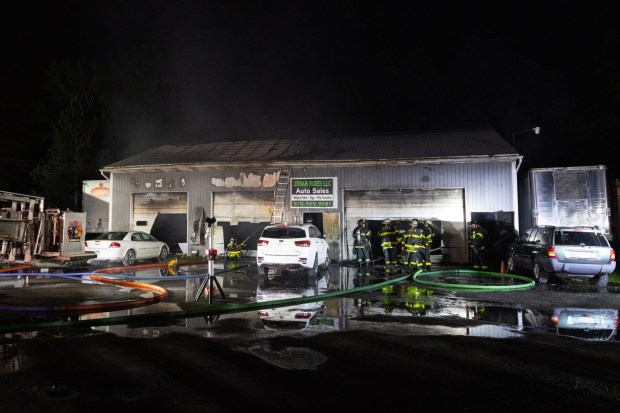 An Old Forge auto sales business - Urban Rides LLC - sustained heavy damage Saturday night after a fire broke out at the property on Sibley Avenue. (Courtesy Christopher Dolan)